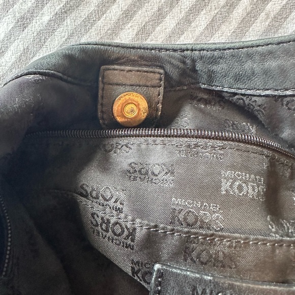 Adorable large black Michael Kors purse with soft leather gold hardware. - Picture 7 of 7
